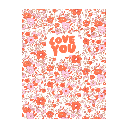 red, pink, and white flowers around red bubble letters that say LOVE YOU