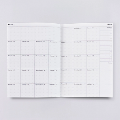 2025 Weekly & Monthly Planner by The Completist