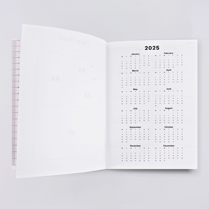 2025 Weekly & Monthly Planner by The Completist