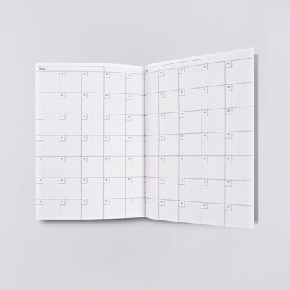 2025 Weekly & Monthly Pocket Planner by The Completist