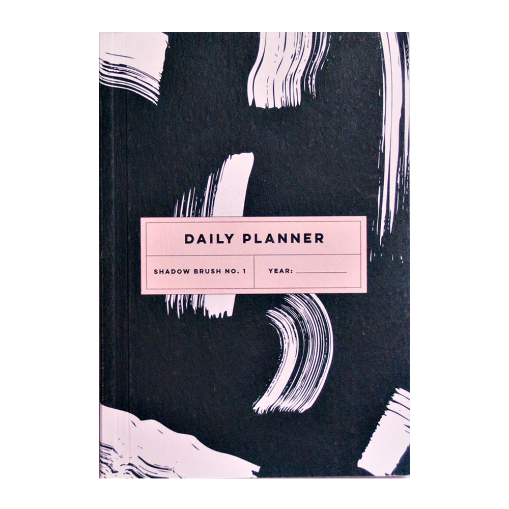 Daily Planner Book by The Completist