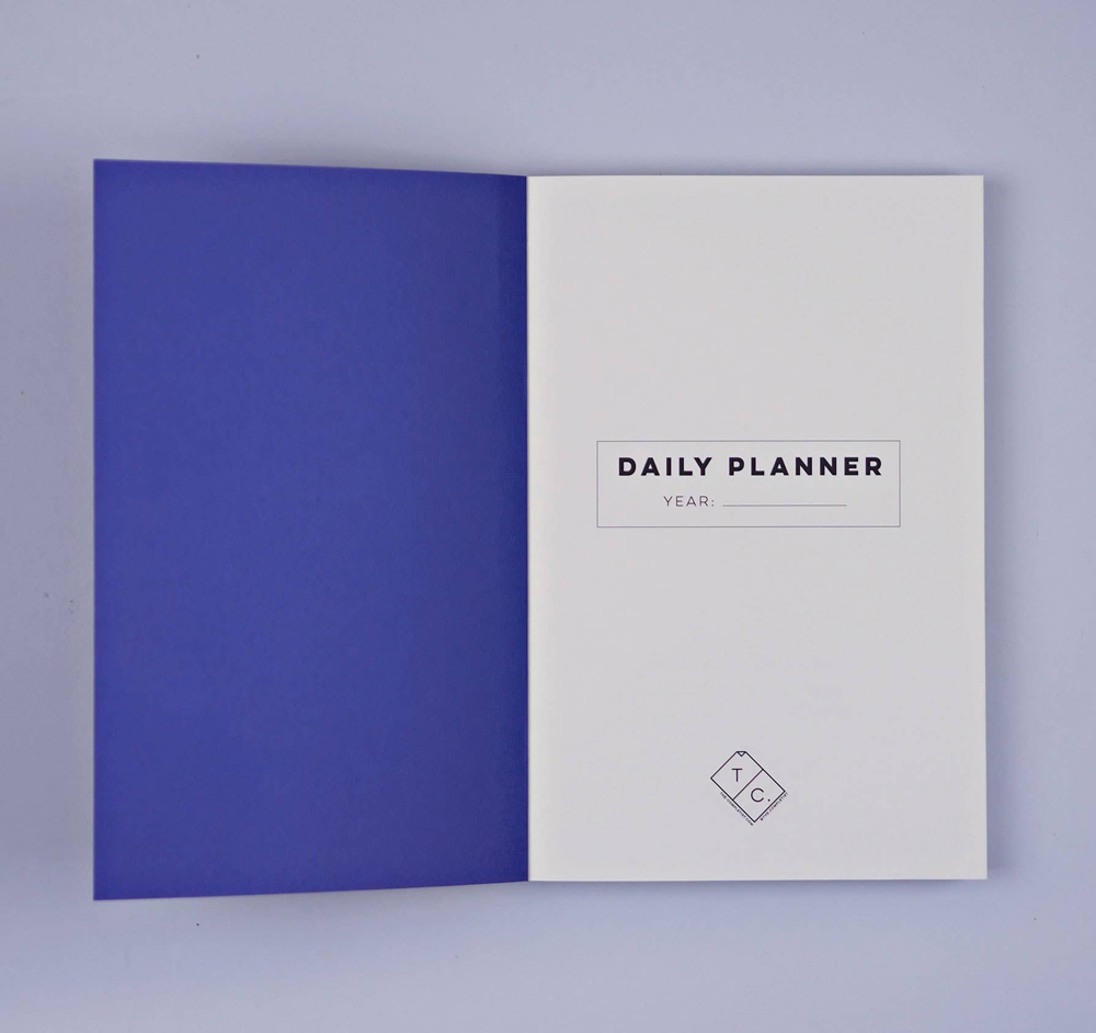 Daily Planner Book by The Completist